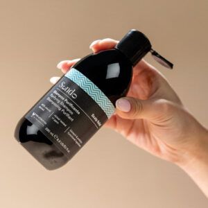 Envase de Champú Purificante Scalp Relief de Sendo Concept, tratamiento contra la caspa y la descamación.