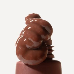 Bálsamo labial Segle Clinical con péptidos y SPF 50, edición Cookie Glaze con acabado brillante